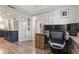 Home office with wood desk and hardwood floors at 318 Windrush Blvd # 10, Indian Rocks Beach, FL 33785