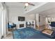 Living room with fireplace and access to other rooms at 318 Windrush Blvd # 10, Indian Rocks Beach, FL 33785