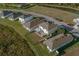 Aerial view of homes showcasing backyard patios and a quiet community at 3829 Silver Strand Trl, Palmetto, FL 34221