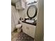 Updated bathroom with a vanity, toilet and a large mirror at 5207 Turquoise Ln # 202, New Port Richey, FL 34652