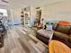 Living room with sectional sofa and wood coffee table at 5207 Turquoise Ln # 202, New Port Richey, FL 34652