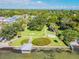 Aerial view of waterfront park with lush greenery, walking paths, and a gazebo at 5570 4Th N Ave, St Petersburg, FL 33710