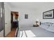 Main bedroom with a bed and office view at 5570 4Th N Ave, St Petersburg, FL 33710