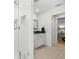 Modern bathroom with a walk-in shower and white vanity at 6000 51St S St, St Petersburg, FL 33715