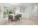 Dining room with wood table and six chairs at 6000 51St S St, St Petersburg, FL 33715