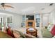 Living room features a fireplace and built-in shelving at 6000 51St S St, St Petersburg, FL 33715