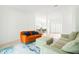 Living room with two sofas and view of dining area at 6000 51St S St, St Petersburg, FL 33715