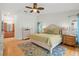 Primary bedroom with king bed and ensuite bathroom at 6000 51St S St, St Petersburg, FL 33715