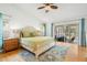 Large Primary bedroom with king-size bed and pool access at 6000 51St S St, St Petersburg, FL 33715