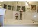 Relaxing bathroom with corner bathtub and decorative accents at 7108 Saint Andrews Ln, Sarasota, FL 34243