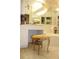 Bathroom boasts a vanity with a comfortable stool at 7108 Saint Andrews Ln, Sarasota, FL 34243
