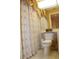 Clean bathroom with toilet and shower/tub combo at 7108 Saint Andrews Ln, Sarasota, FL 34243