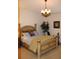 Spacious bedroom with large bed and decorative accents at 7108 Saint Andrews Ln, Sarasota, FL 34243