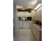 Fully equipped kitchen with ample counter space and storage at 7108 Saint Andrews Ln, Sarasota, FL 34243