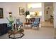 Spacious living room with ample seating and large windows at 7108 Saint Andrews Ln, Sarasota, FL 34243