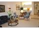 Spacious living room with ample seating and high ceilings at 7108 Saint Andrews Ln, Sarasota, FL 34243