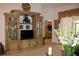 Living room with built-in shelving and TV at 7108 Saint Andrews Ln, Sarasota, FL 34243