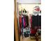 Well-organized walk-in closet with shelving and rods at 7108 Saint Andrews Ln, Sarasota, FL 34243