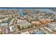 An aerial shot showcasing a building's prime location near a waterway and beach at 11605 Gulf Blvd # 505, Treasure Island, FL 33706