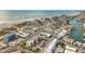 Aerial view of beachfront property, showcasing a multi-story building and ocean at 11605 Gulf Blvd # 505, Treasure Island, FL 33706