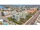 An aerial view showing a building's location near the coast and other buildings at 11605 Gulf Blvd # 505, Treasure Island, FL 33706
