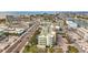 Aerial view showcasing a coastal building's location and surrounding neighborhood at 11605 Gulf Blvd # 505, Treasure Island, FL 33706