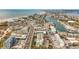 Coastal property aerial view, showing the building's proximity to the beach and waterway at 11605 Gulf Blvd # 505, Treasure Island, FL 33706