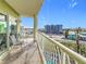 Spacious balcony with ocean views and seating for two at 11605 Gulf Blvd # 505, Treasure Island, FL 33706