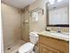 Bathroom with shower and granite countertop at 11605 Gulf Blvd # 505, Treasure Island, FL 33706