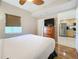 Bedroom with kitchen view and dresser at 11605 Gulf Blvd # 505, Treasure Island, FL 33706