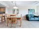 Bright dining area with glass top table and seating for four at 11605 Gulf Blvd # 505, Treasure Island, FL 33706