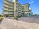 Attractive three-story building with ample parking and landscaped grounds at 11605 Gulf Blvd # 505, Treasure Island, FL 33706