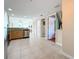 Open kitchen with stainless steel appliances and light wood cabinets at 11605 Gulf Blvd # 505, Treasure Island, FL 33706
