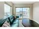 Living room with ocean view and comfy seating at 11605 Gulf Blvd # 505, Treasure Island, FL 33706