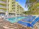 Enjoy the sun on one of the many lounge chairs surrounding the refreshing pool at 11605 Gulf Blvd # 505, Treasure Island, FL 33706