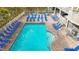 Relax by the refreshing pool and spa with plenty of lounge chairs available at 11605 Gulf Blvd # 505, Treasure Island, FL 33706
