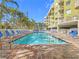 Enjoy this refreshing pool and spa, complete with plenty of lounge chairs for relaxing in the sun at 11605 Gulf Blvd # 505, Treasure Island, FL 33706