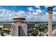 Aerial view of a hotel near an airport with a control tower at 12200 Vonn Rd # 2109, Largo, FL 33774