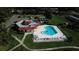 Community pool and clubhouse viewed from above at 12200 Vonn Rd # 2109, Largo, FL 33774