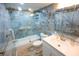Stylish bathroom with blue marble tile and bathtub at 12200 Vonn Rd # 2109, Largo, FL 33774