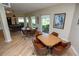 Community room with game tables and seating at 12200 Vonn Rd # 2109, Largo, FL 33774