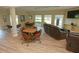 Community room with comfortable seating and large windows at 12200 Vonn Rd # 2109, Largo, FL 33774
