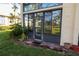 Ground level exterior view of condo with patio at 12200 Vonn Rd # 2109, Largo, FL 33774