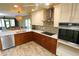 Modern kitchen with stainless steel appliances and quartz countertops at 12200 Vonn Rd # 2109, Largo, FL 33774