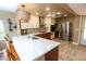 Updated kitchen featuring a breakfast bar and stainless steel appliances at 12200 Vonn Rd # 2109, Largo, FL 33774