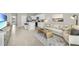 Open concept kitchen boasts modern appliances and a breakfast bar at 1516 Hammer Pl, Largo, FL 33774