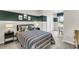 Charming bedroom with a twin-size bed, built-in desk, and playful decor at 1524 Hammer Pl, Largo, FL 33774