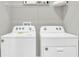 Convenient laundry room with side-by-side washer and dryer at 1524 Hammer Pl, Largo, FL 33774