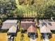 Aerial view of house and surrounding homes at 1597 Franklin Way, Dunedin, FL 34698