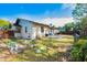 Nice backyard with a patio and wooden fence at 1597 Franklin Way, Dunedin, FL 34698